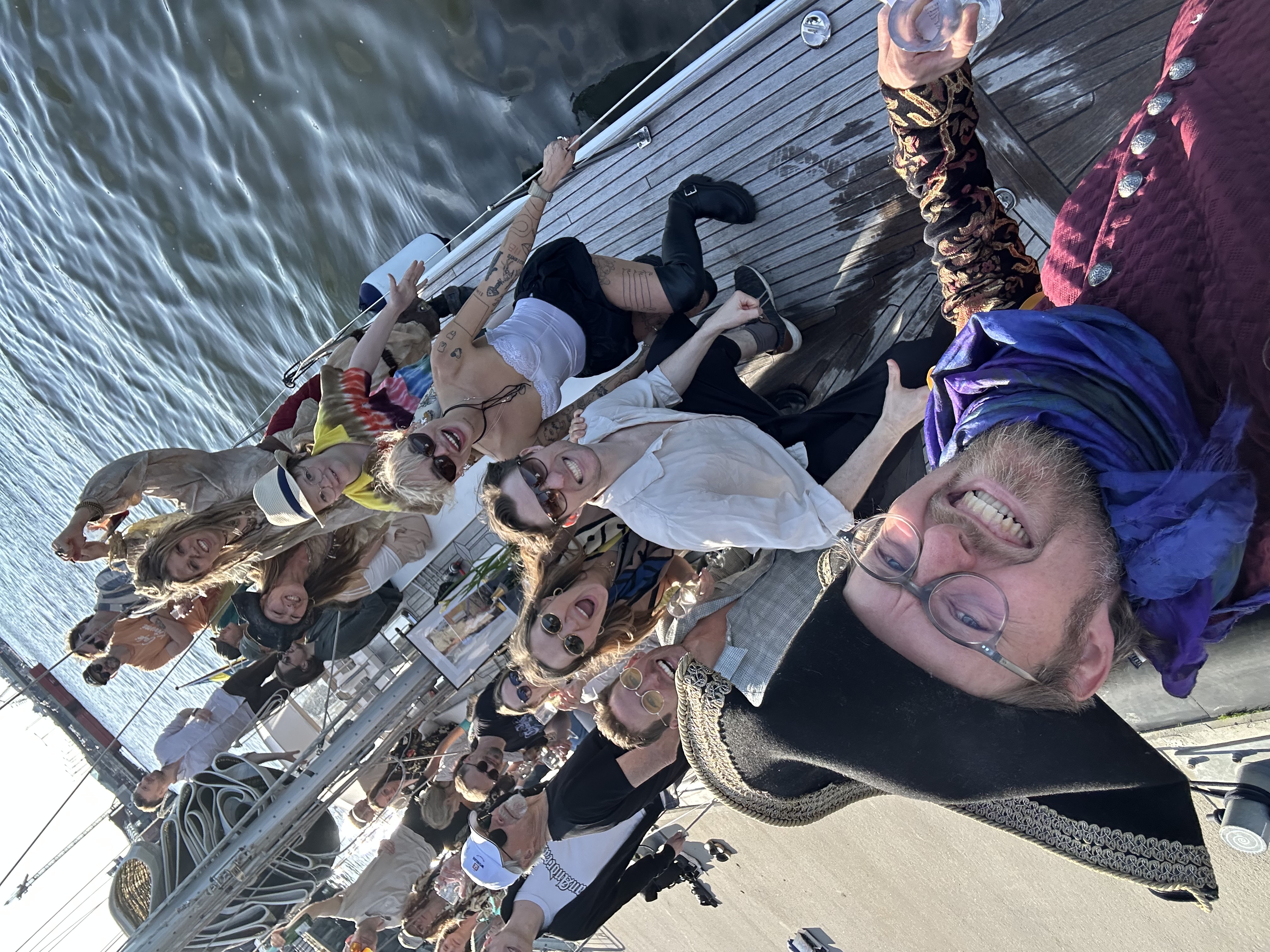 The crew of Iris — group selfie on deck at Fotografiska