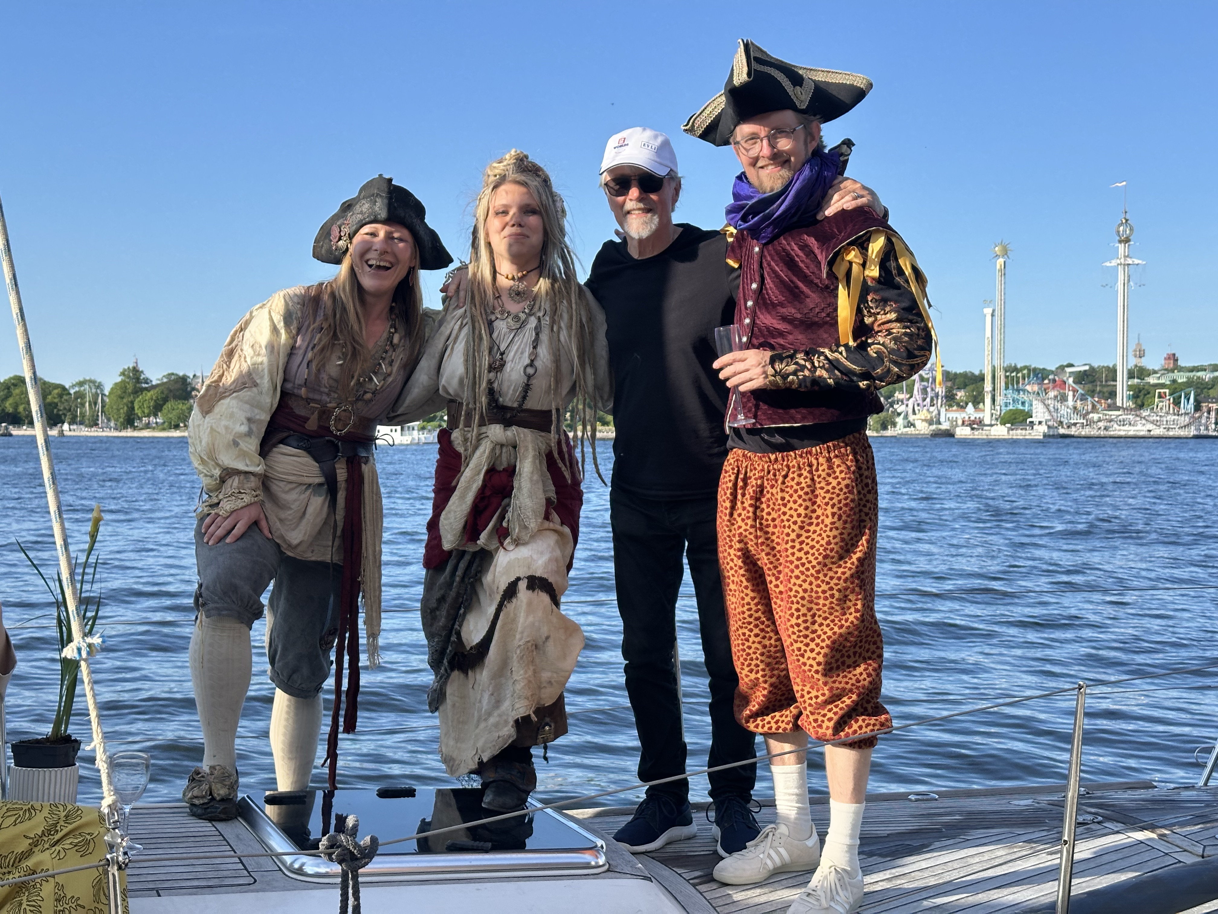 Four pirates on deck — Frida's band Ye Banished Privateers join the ceremony