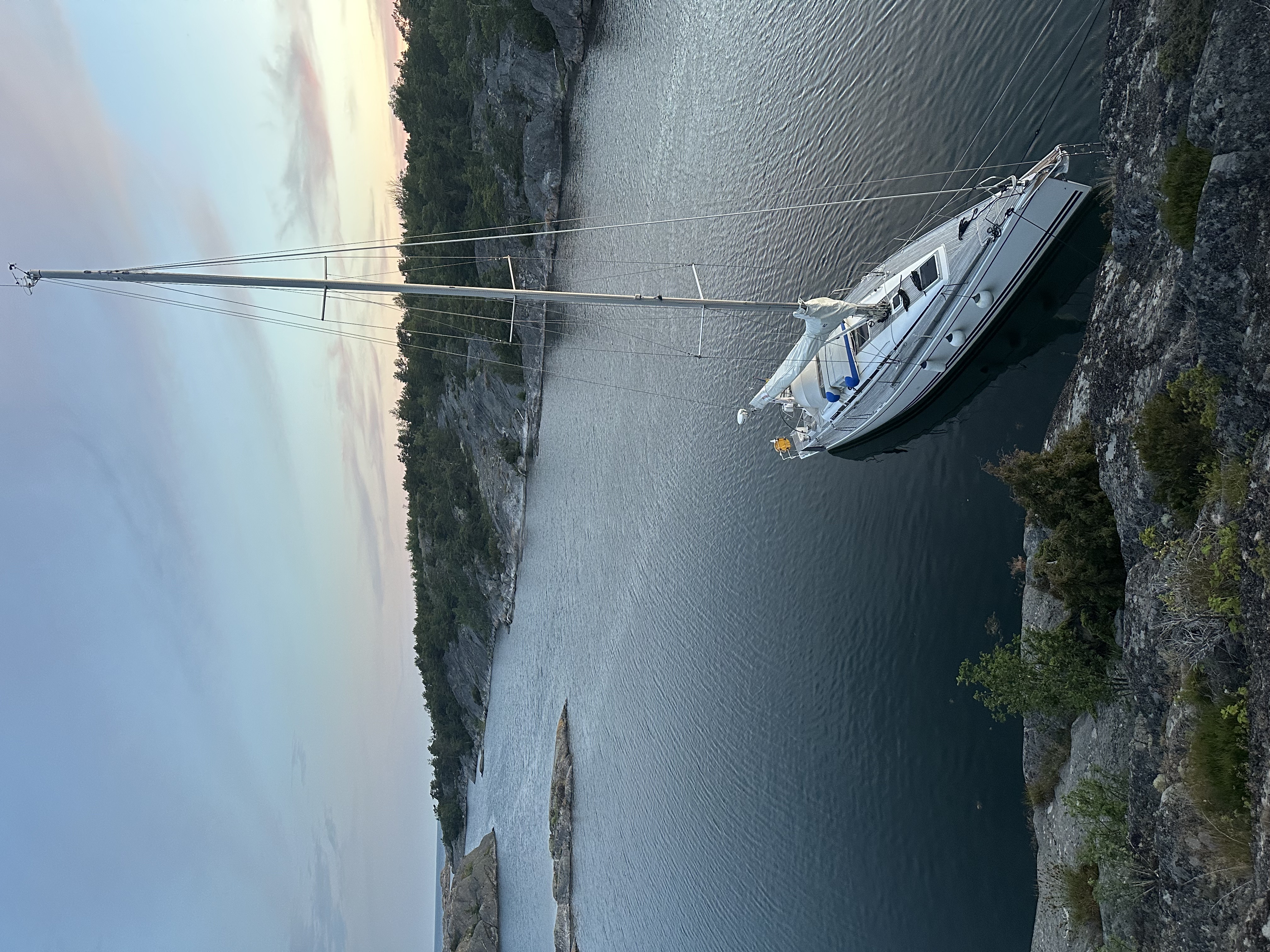 Iris moored at Suppskär as dusk settles over the cove