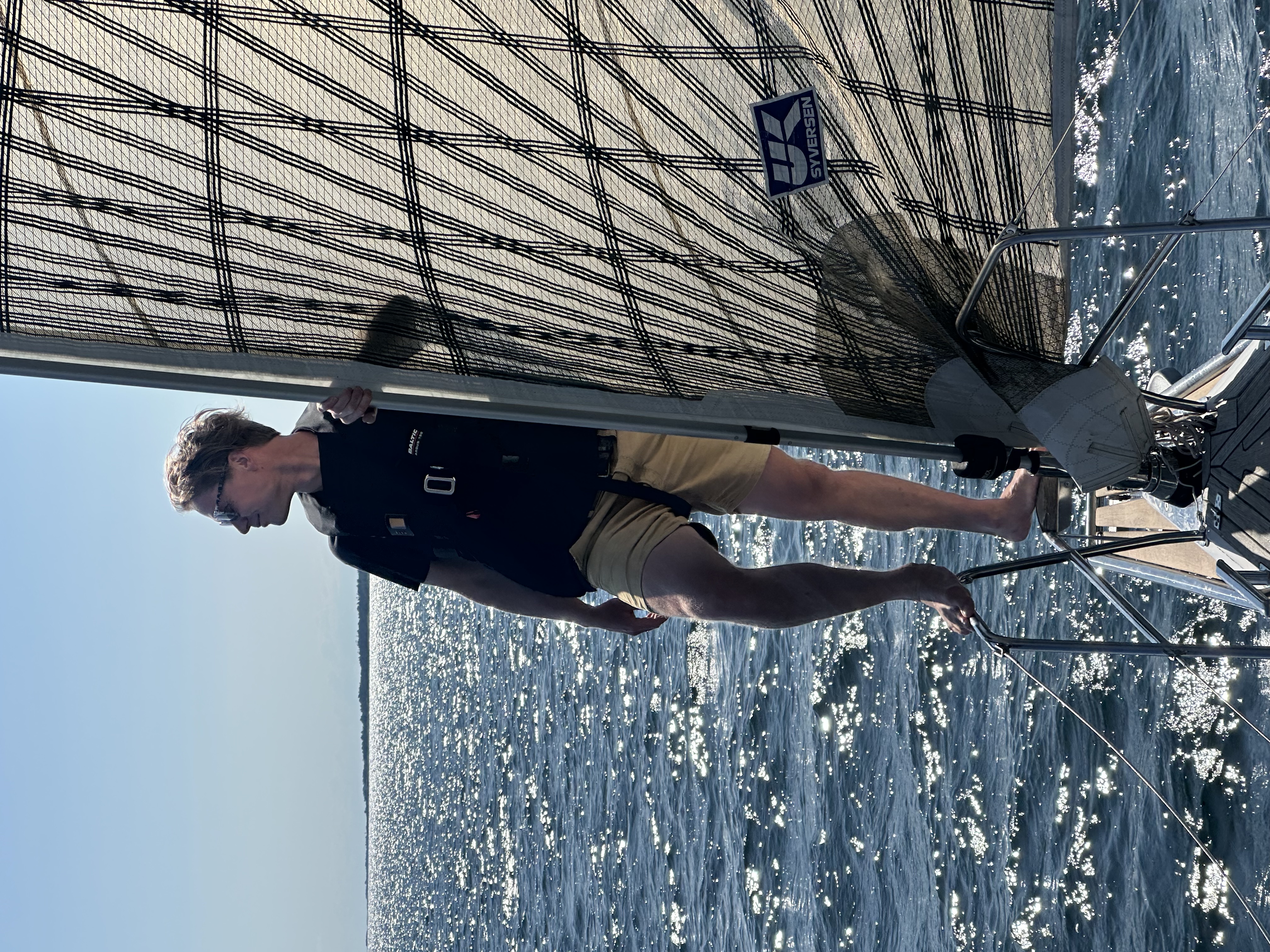 Per standing on the bow, watching the horizon